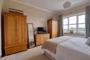 Bedroom One- click for photo gallery